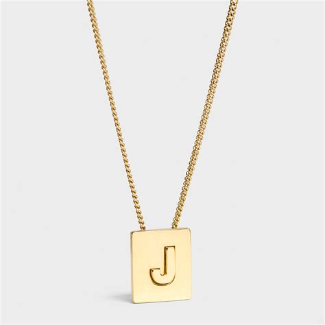 celine alphabet pendant j|ALPHABET J NECKLACE IN BRASS WITH GOLD FINISH.